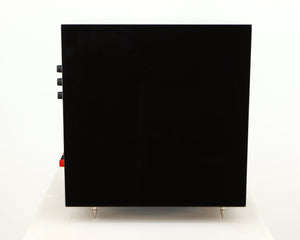 Left side view of a used B&W ASW10CM Subwoofer in a gloss black finish