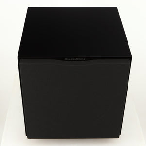 Top of a used B&W ASW10CM Subwoofer in a gloss black finish