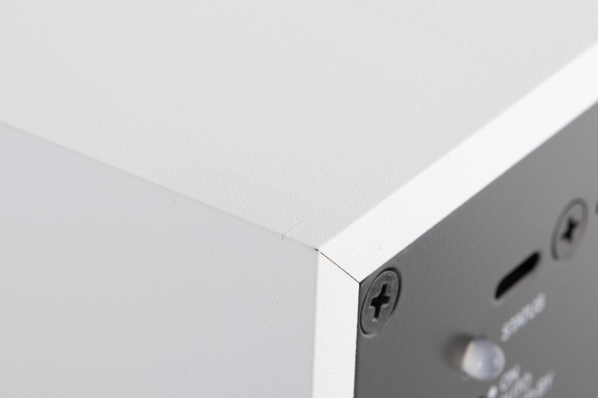 Close up of a used B&W ASW608 Subwoofer in a Matt White finish showing tiny scratch on top