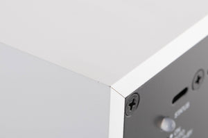 Close up of a used B&W ASW608 Subwoofer in a Matt White finish showing tiny scratch on top