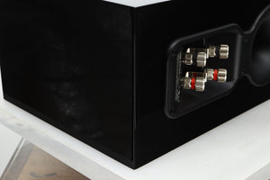 Rear left corner view of a used B&W CM Centre S2 Centre Speaker in Gloss Black finish 