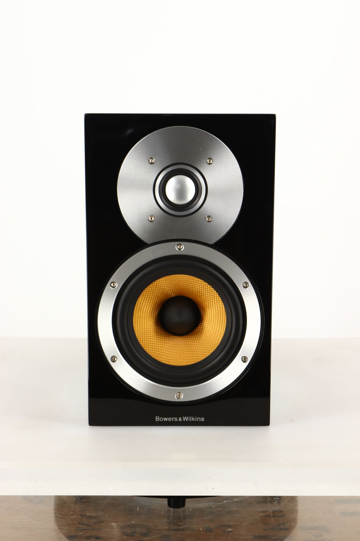 Front view of a used B&W CM1 Standmount Speaker in Gloss Black finish