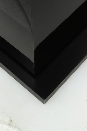 Close up of a used B&W CM8 S2 Floorstanding Speaker in a piano black finish showing some damage on the base