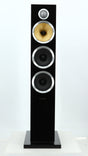 Front view of a used B&W CM8 S2 Floorstanding Speaker in a piano black finish