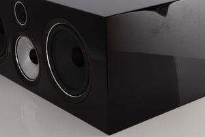 Front right corner of a used B&W HTM 71 S2 Centre Speaker in a Black Gloss finish