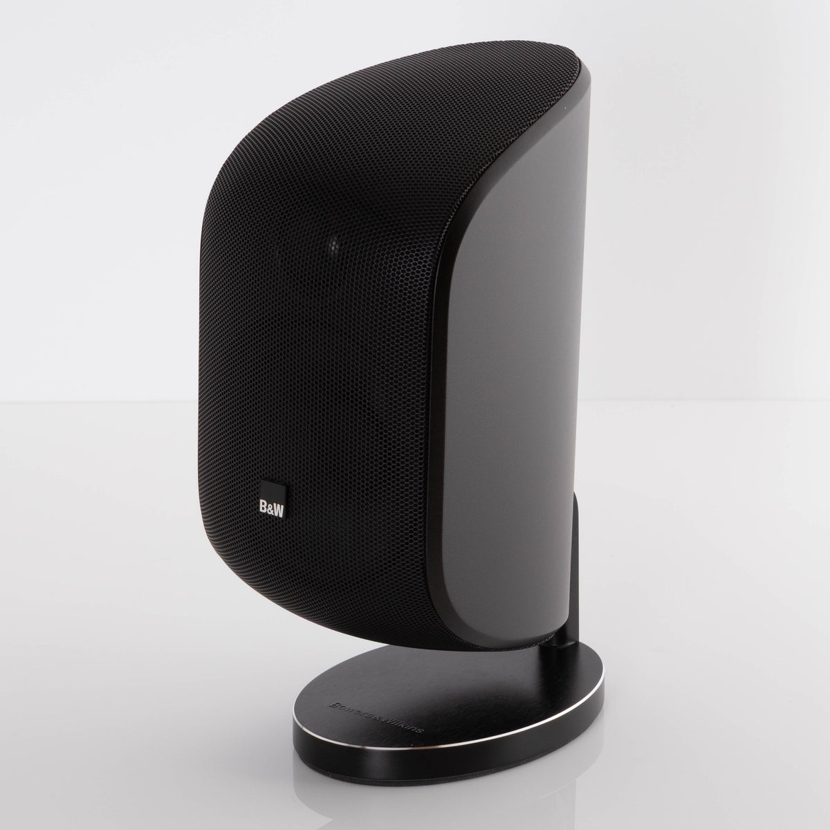 Front right corner of a used B&W M-1 Mini Theatre Speaker in a Matte Black finish