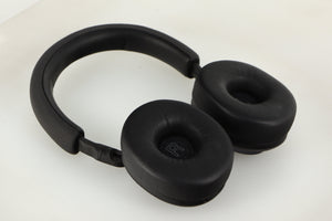 Close up of used B&W PX5 Noise Cancelling Wireless Headphones in a space grey finish showing inside of right earmuff