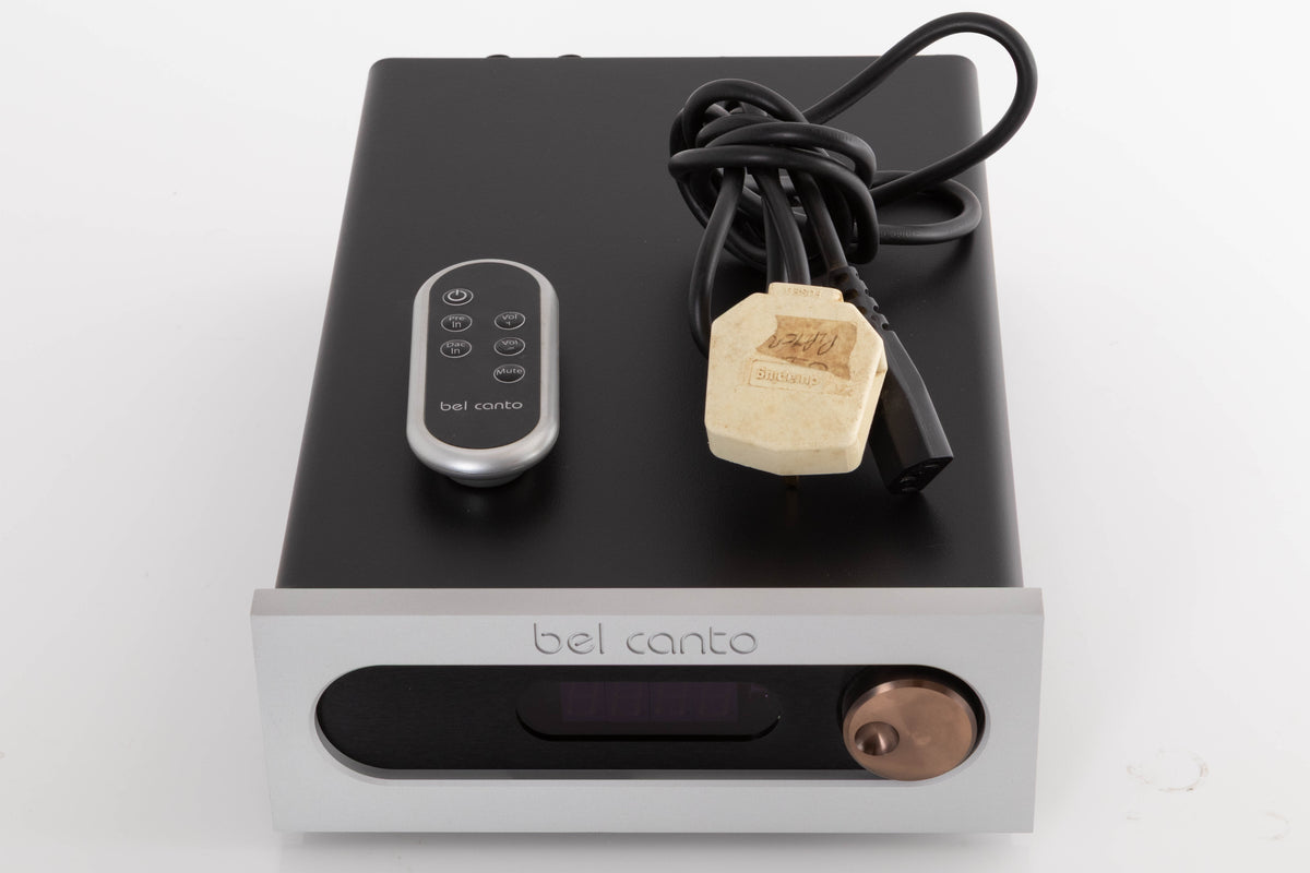 Top of a used Bel Canto PRe 3 Pre Amplifier showing Remote and Batteries