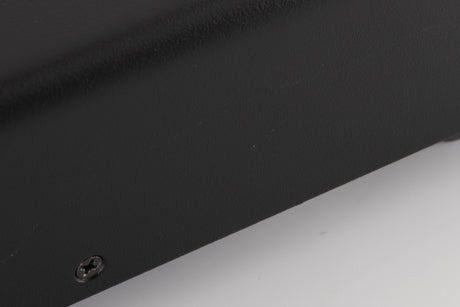 Close up of a used Bel Canto PRe 3 Pre Amplifier showing scratches on left side