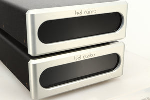 Close up view of a used pair of Bel Canto REF600M Monoblock Power Amplifiers in Silver finish