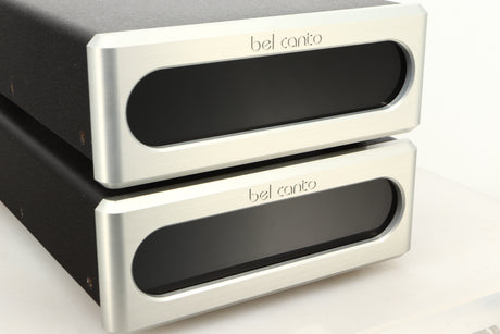 Close up view of a used pair of Bel Canto REF600M Monoblock Power Amplifiers in Silver finish