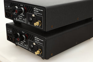 Rear right corner view of a used pair of Bel Canto REF600M Monoblock Power Amplifiers in Silver finish