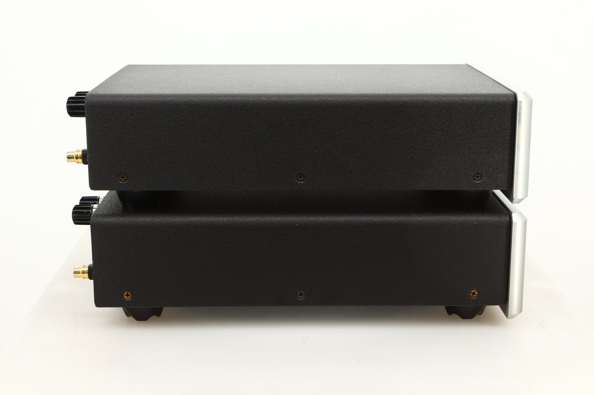 Side view of a used pair of Bel Canto REF600M Monoblock Power Amplifiers in Silver finish