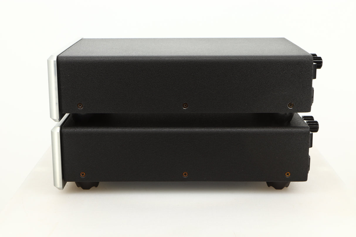 Side view of a used pair of Bel Canto REF600M Monoblock Power Amplifiers in Silver finish