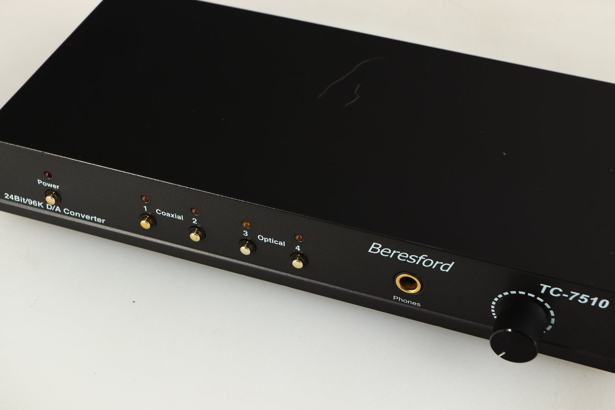 Close up of a used Beresford TC7510 Digital Analogue Converter in a black finish showing fascia