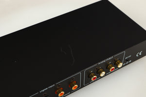 Close up of a used Beresford TC7510 Digital Analogue Converter in a black finish showing scratch on top