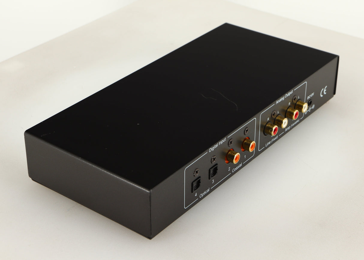 Rear right corner of a used Beresford TC7510 Digital Analogue Converter in a black finish