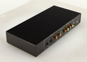 Rear right corner of a used Beresford TC7510 Digital Analogue Converter in a black finish