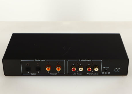 Rear view of a used Beresford TC7510 Digital Analogue Converter in a black finish showing Phono Inputs, Phono Outputs and Optical Inputs