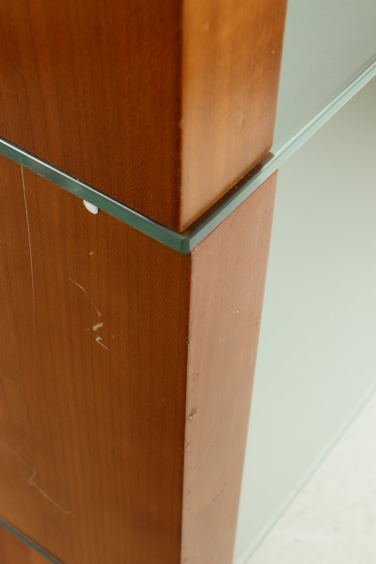 Close up of a used BLOK Hifi Stand Shelf 3 in a cherry finish showing some scratches