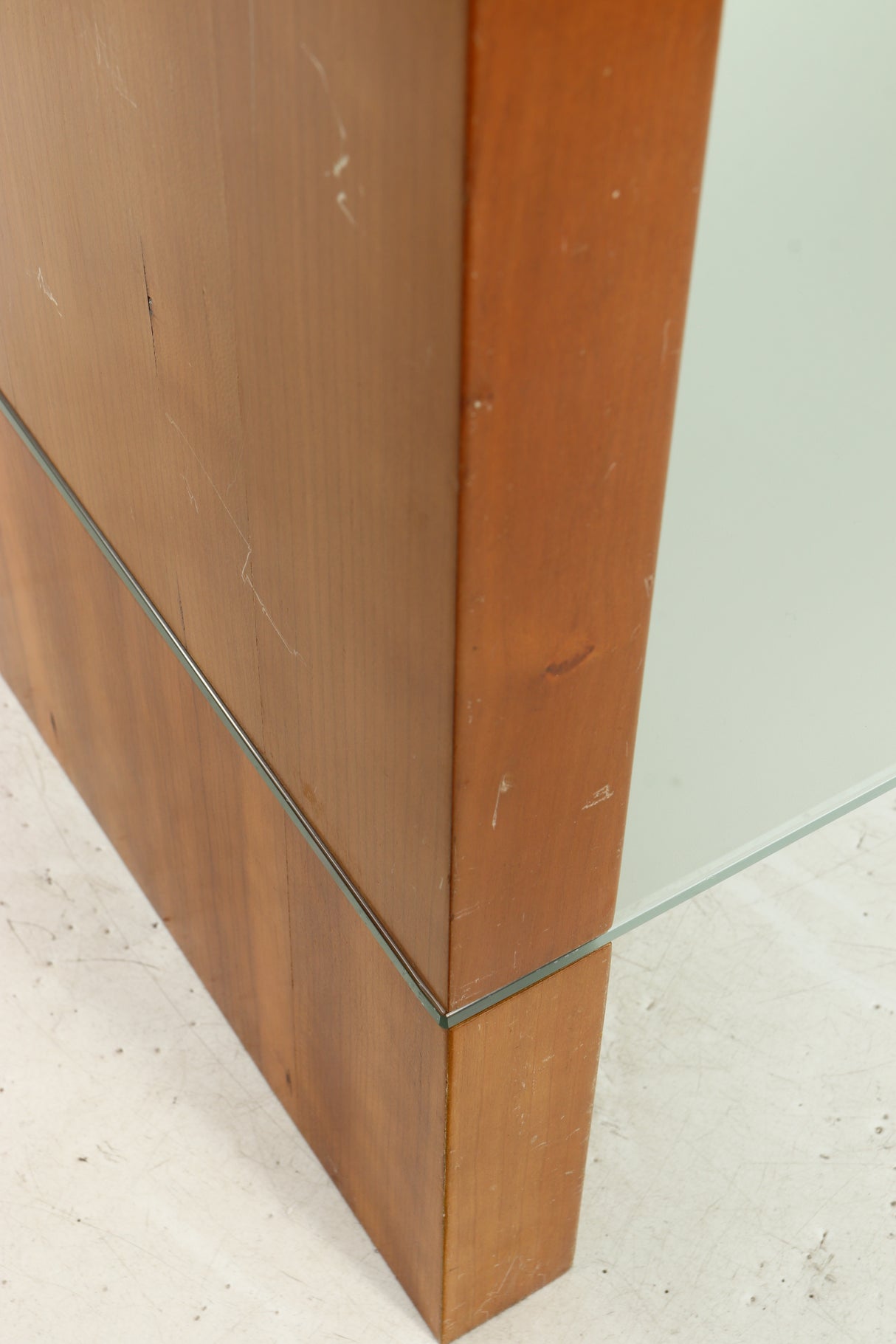 Close up of a used BLOK Hifi Stand Shelf 3 in a cherry finish showing some scratches