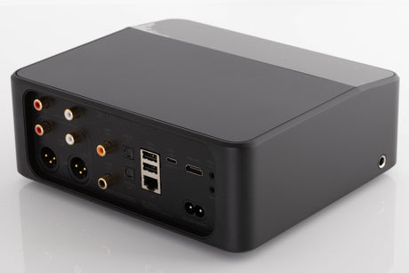 Rear left corner of a used Bluesound Node Icon Music Streamer in a Black finish
