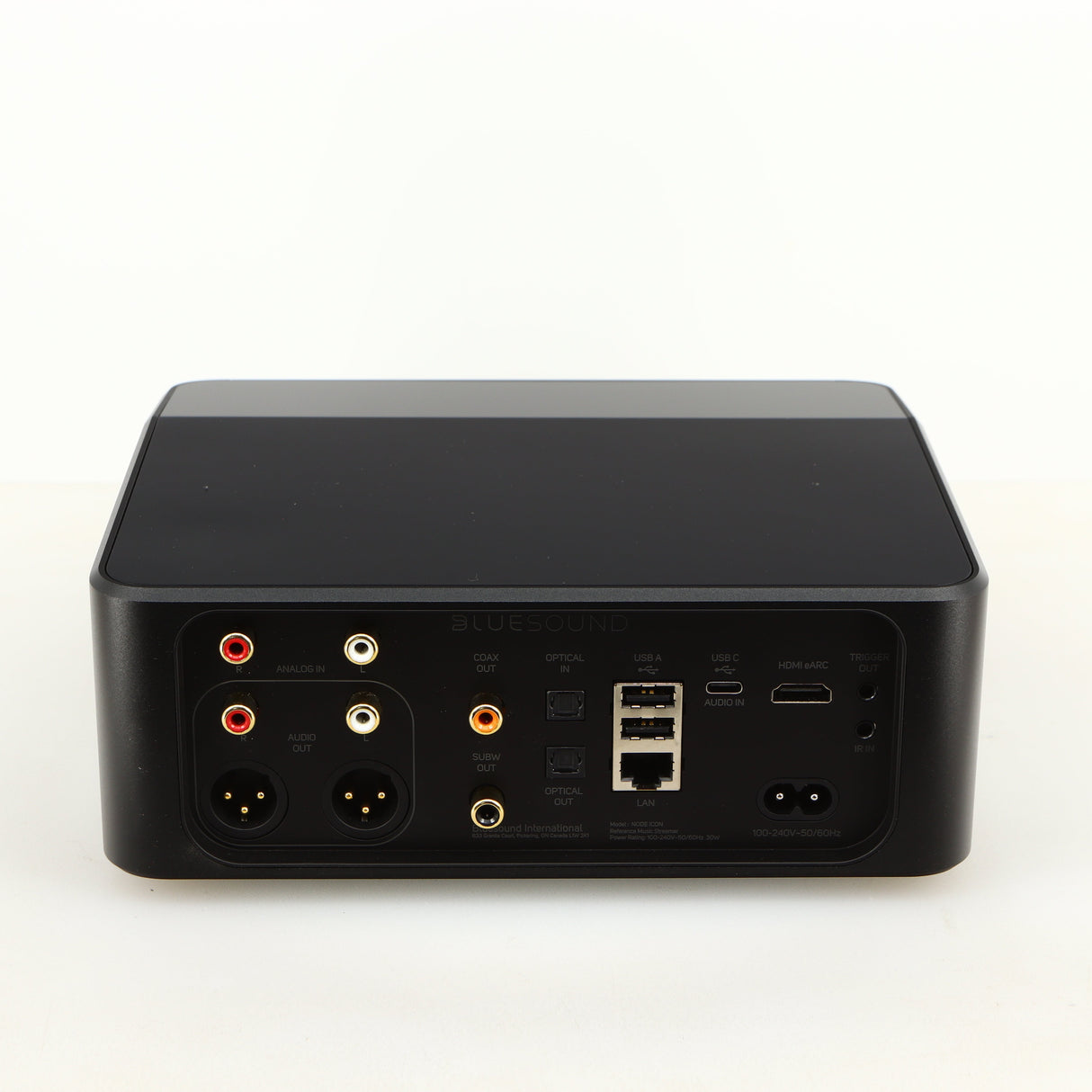 Rear view of a used Bluesound Node Icon Streamer in a black finish showing HDMI Output, Phono Inputs, Phono Outputs, Power Input, Network Input and USB Input