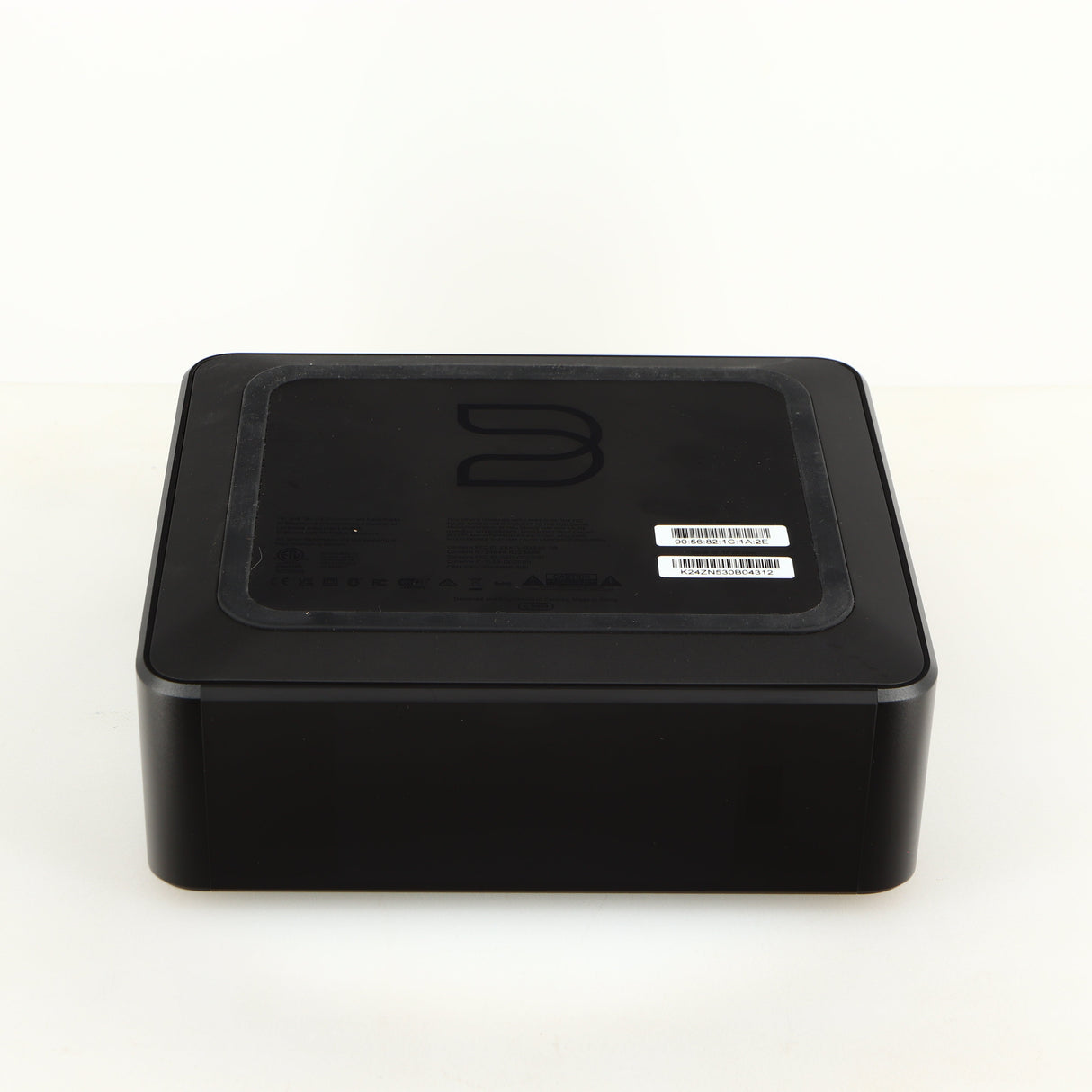 Underside of a used Bluesound Node Icon Streamer in a black finish