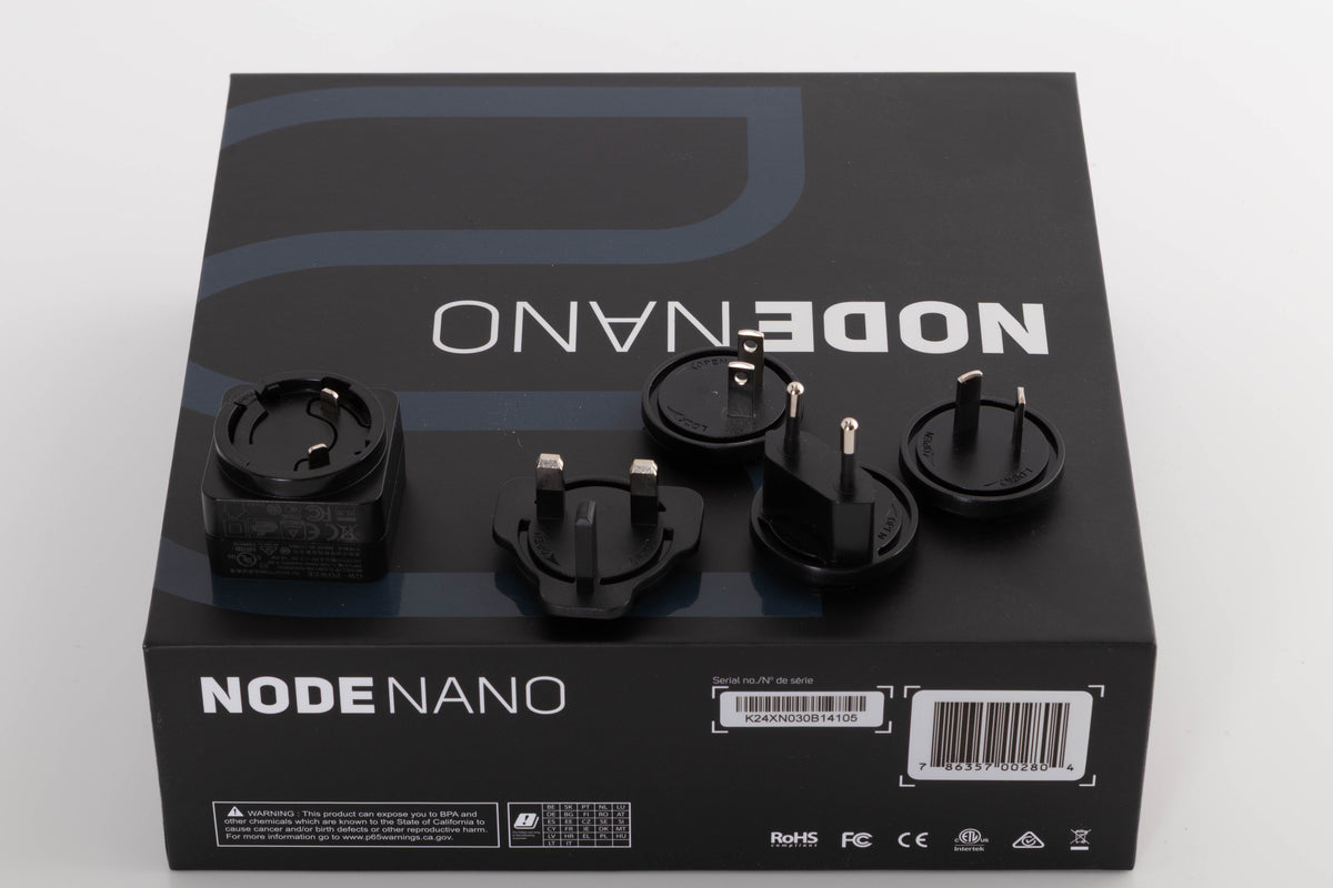 Box for a used Bluesound Node Nano Streamer in a Black finish showing PSU, Schuko Plug and Mains Plug