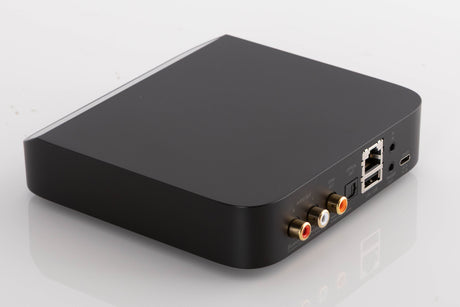 Rear right corner of a used Bluesound Node Nano Streamer in a Black finish