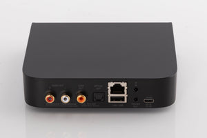 Rear view of a used Bluesound Node Nano Streamer in a Black finish showing Phono Outputs, Coaxial Output, Optical Output, Power Input and Network Input