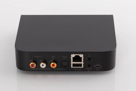 Rear view of a used Bluesound Node Nano Streamer in a Black finish showing Phono Outputs, Coaxial Output, Optical Output, Power Input and Network Input