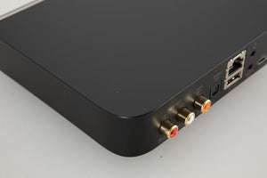 Rear left corner view of a used Bluesound Node Nano Streamer