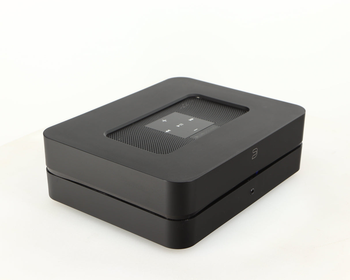Front left corner of a used Bluesound Powernode 2i Streaming Amplifier in a black finish