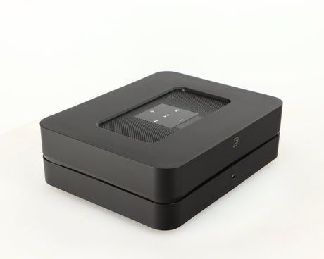 Front left corner of a used Bluesound Powernode 2i Streaming Amplifier in a black finish