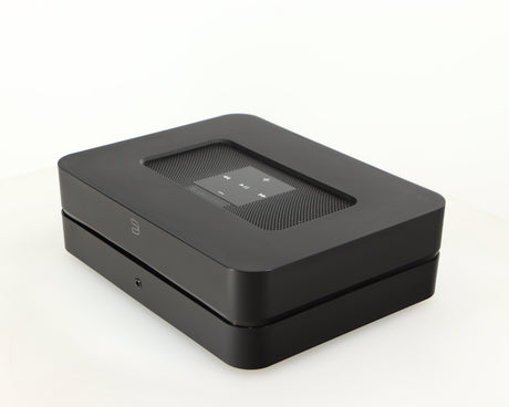 Front right corner of a used Bluesound Powernode 2i Streaming Amplifier in a black finish