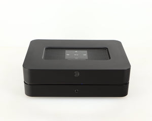 Front view of a used Bluesound Powernode 2i Streaming Amplifier in a black finish