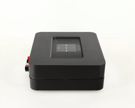 Left side view of a used Bluesound Powernode 2i Streaming Amplifier in a black finish