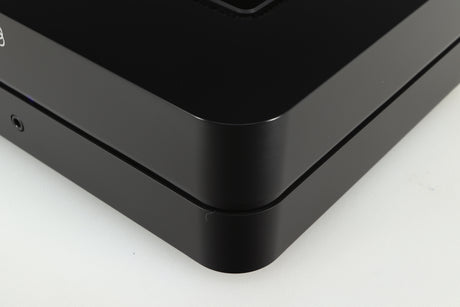 Front right corner of a used Bluesound Power Node Streamer in a black finish