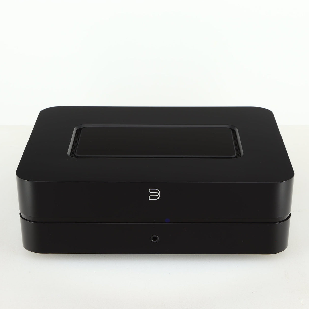 Front view of a used Bluesound Power Node Streamer in a black finish