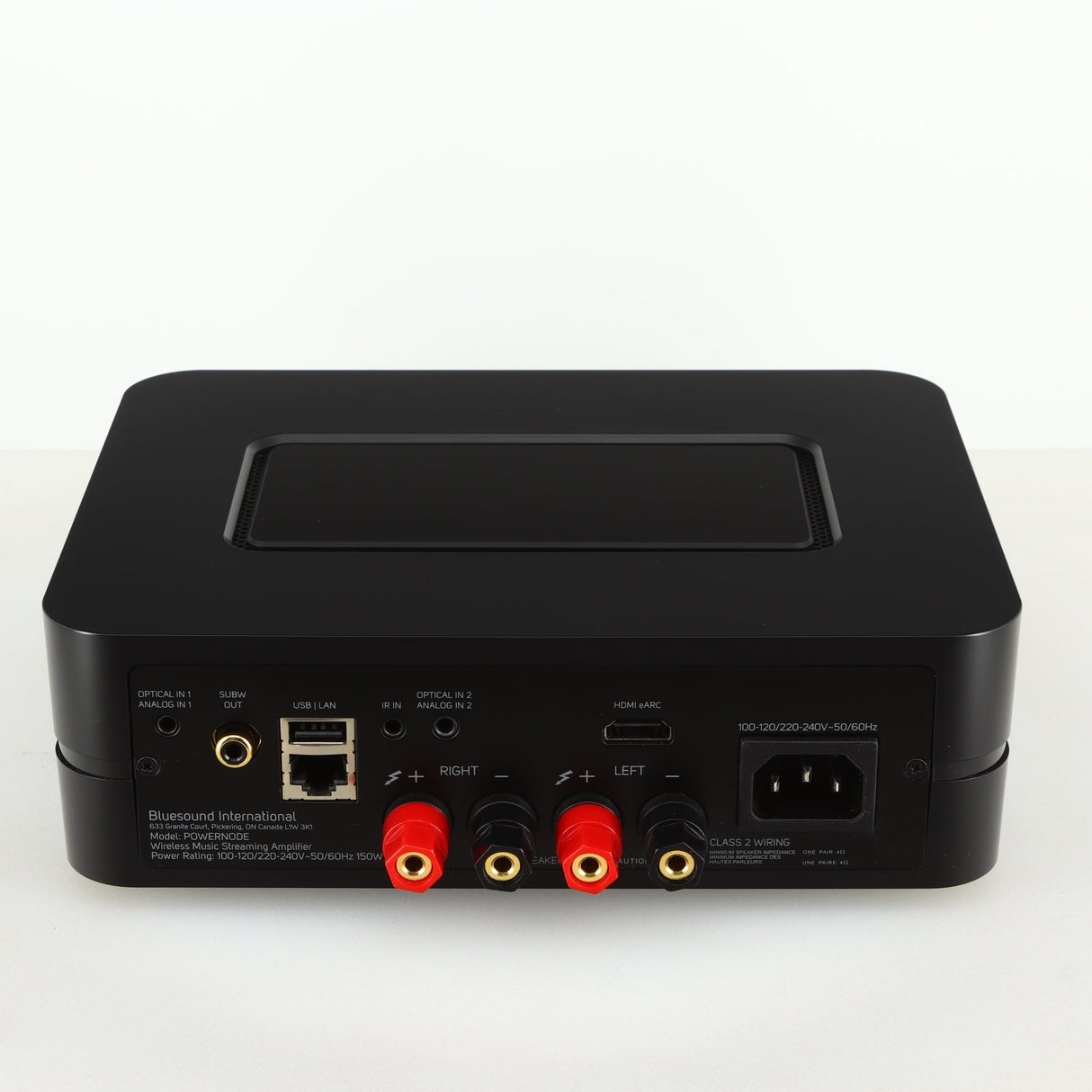 Rear view of a used Bluesound Power Node Streamer in a black finish showing Mains Input, HDMI Input, Speaker Input and Optical Input