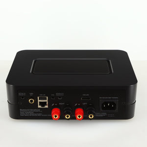 Rear view of a used Bluesound Power Node Streamer in a black finish showing Mains Input, HDMI Input, Speaker Input and Optical Input
