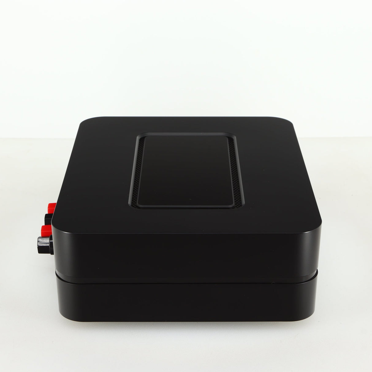 Left side view of a used Bluesound Power Node Streamer in a black finish