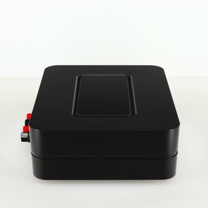 Left side view of a used Bluesound Power Node Streamer in a black finish