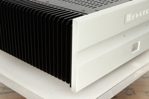 Front left corner view of a used Bryston 4BSST2 Power Amplifier in Silver finish