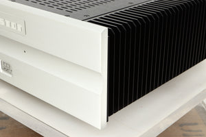 Front right corner view of a used Bryston 4BSST2 Power Amplifier in Silver finish