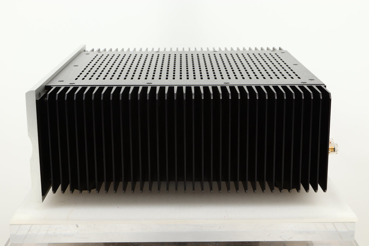 Side view of a used Bryston 4BSST2 Power Amplifier in Silver finish