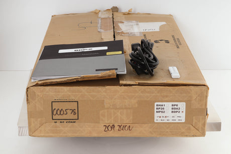 Box of a used Bryston BDP-2 17" Digital Player with mains cable, manual, and USB