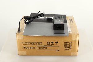 Box of a used Bryston BDP Pi Network Player with manual, and mains adaptor