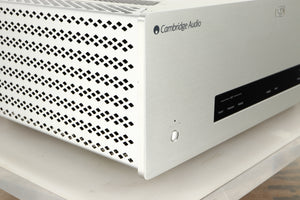 Front left corner of a used Cambridge Audio 851W Power Amplifier in a silver finish